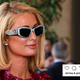Paris Hilton wearing sunglasses on the red carpet